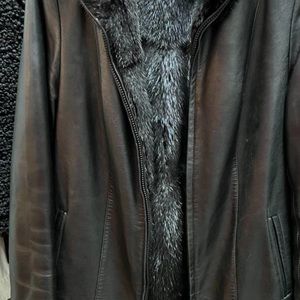 Leather coat with reversible fur inside